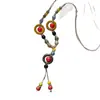 Collar largo con colgante de mariposa de cerámica de estilo étnico exótico, un accesorio de cadena para suéter bohemio y vintage para mujer
