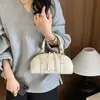 Nueva bolsa Boston de ante popular para otoño 2026, bandolera retro, bolsa de mensajero súper popular, bolsa de bowling para mujer, bolso de mano