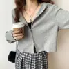 Popular en Tiktok al por mayor otoño e invierno estilo coreano camiseta de manga larga con capucha para mujer chaqueta cárdigan de diseño holgado con cremallera corta