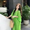 Vestido Verde de Cuello en V Estilo Perezoso para Mujer 2026 Nuevo Estilo Manga Murciélago Ligero Transparente Vestido Camisa Vestido de Vacaciones en la Costa