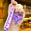 Chaveiro Pirulito Areia Movediça Luminoso Infundido com Óleo Pingente Fofo para Mochila Chaveiro Presente de Parque de Diversões Brinquedo Infantil