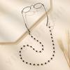 Fabricante transfronterizo de gafas con pequeñas cuentas de arroz, populares en Europa y América, con cadena colgante antideslizante y cordón para gafas de cristal de color sólido.
