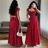Vestido Rojo de Lunares sin Espalda de Venta Caliente 2026 para Mujer, Nuevo Estilo de Verano, Ceñido a la Cintura, Adelgazante, Estilo para Vacaciones en la Playa Vestido Largo