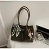 Bolsa Retrô de Grande Capacidade para Mulheres 2026 Nova Tendência de Alta Qualidade Versátil Bolsa de Ombro para Sair para o Trabalho e Deslocamento Bolsa Tote
