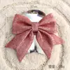 Venta al por mayor de fábrica Accesorios de Navidad Adornos forma tridimensional Adornos de pared Lazo Colgantes de árbol de Navidad Suministros de decoración