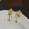 Estilo nuevo de verano Micro incrustado de circonita pendientes de botón elegantes para mujer Aguja de plata S925 pendientes de borla de pétalo de alta calidad pendientes exquisitos