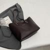 Bolso de mano texturizado estilo coreano para ir al trabajo 2024 Invierno nuevo casual simple de hombro axilar bolso tote para mujeres