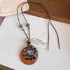 Collar de borlas acrílicas transfronterizo europeo y americano, sensación de lujo ligero y alta gama, cadena para la clavícula con diseño Maillard, joyería de nicho para mujeres