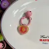 Llavero colorido de frutas con cascabeles, sandía, granada, guayaba, colgante de juguete de comida en miniatura, accesorio versátil para bolso
