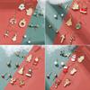 Pendientes de campana con copos de nieve de la serie navideña, combinación de traje, comercio exterior, gran oferta, pendientes de alce con gotas de aceite de dibujos animados para hombre mayor, mujeres