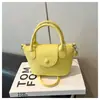 Bolso de Mano de Color Sólido con Textura de Lichi Estilo Coreano para Mujer 2026 Verano Nuevo Bolso Cruzado Simple Versátil Casual de Moda