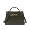 Bolso de mano texturizado con patrón de cocodrilo para mujer, nueva colección 2026, bolso de estilo Kelly, de nicho y lujoso, adecuado para el trabajo y el uso casual, se puede llevar como bolso de hombro o bolso cruzado