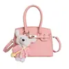 Bolso de Mano de Gran Capacidad de Moda Estilo Coreano para Mujer 2026 Nuevo Modelo Textura Simple Bolso Kelly Diseño de Nicho Bolso Cruzado