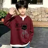 Camiseta de Manga Larga Waffle con Estampado de Dibujos Animados Nuevo y Elegante para Niños, Atuendo Popular Versátil para Niños Mayores, Primavera y Otoño 2026