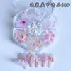 Caja de Flor de Ciruelo con Lazos de Perla, Flores de Dibujos Animados, Pedrería Mixta para Uñas, Decoraciones Brillantes para Uñas, Decoraciones Mixtas al por Mayor