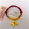 Pulsera tejida hecha a mano para el año de nacimiento, Pulsera de hilo dorado arena rojo al por mayor, Hazte rico inmediatamente, Tejido de bolsa de la suerte del Dios de la Riqueza amarillo
