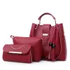 Bolso nuevo para mujer transfronterizo color sólido moda cuentas borla bolso de madre de tres piezas bolso de hombro de moda mayoreo de comercio exterior