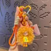 Chaveiro de Menina Cacheada Tendência Legal Desenho Animado Pingente de Silicone Boneca Espuma de Leite Decoração de Bolsa Feminina Pequeno Presente Porta-Chaves