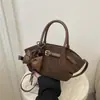 Bolsos de tendencia transfronterizos 2026 nuevo bolso de nicho con asa de lazo para mujer simple casual de un solo hombro cruzado para el trabajo
