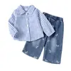 Exclusivo Transfronteiriço Conjunto Europeu e Americano Primavera e Outono para Bebês e Crianças Pequenas Meninas Camisa de Manga Longa Listrada + Calça Jeans Conjunto de Duas Peças
