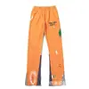 Pantalones Largos Casuales Unisex con Estampado de Letras Logo y Cordón Estilo Básico Tinta Salpicada Ropa de Pareja