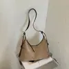 Bolsa de Axila Estilo Coreano Retrô Milennial Feminina Nova Moda Outono 2026 Bolsa de Ombro Único Fosca Bolsa Transversal de Nicho