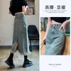 Saia Jeans Feminina de Cintura Alta com Fenda Posterior Outono Fina Nova Primavera 2024 Saia Midi Linha A Quadril