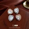 Pendientes de Corazón de Circonita de Aguja de Plata Europeos y Americanos Lujo Ligero Nicho Gama Alta Exquisitos Pendientes de Botón Moda Versátil Pendientes al por Mayor para Mujer