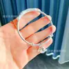 Fornecimento ao Vivo de Pulseiras Seiko de Bambu Push-Pull para Mulheres Pulseiras Sólidas Brilhantes de Paz e Alegria Pulseiras da Moda Atacado