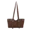 Bolso de mano estilo coreano para mujer, nuevo bolso de hombro único de moda 2026, estampado de leopardo único con remaches, bolso tote de gran capacidad para mujer