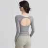 Roupa de treino fitness yoga corrida ao ar livre com recortes e manga longa outono/inverno 2026