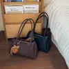 Bolso tote grande de color liso, alta capacidad, para el trabajo y los desplazamientos, para mujer, nuevo modelo 2026, bandolera casual de moda, bolso grande
