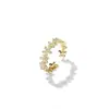 Anillo de Flor Pequeña de Zirconia Dorada para Mujer, Diseño Abierto Ajustable, Joyería Versátil de Lujo de Gama Alta de Nicho Nuevo 2025