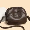Bolso pequeño redondo transfronterizo, nueva moda 2024, bolso para madres de mediana edad, bolso cruzado de hombro para mujer, bolso para teléfono móvil de moda coreana que combina con todo.
