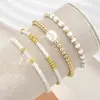 Han Zhishang ofrece venta al por mayor de pulseras multicapa de cuentas de arroz blanco y perlas de estilo europeo y americano transfronterizas, joyería simple y moderna