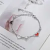 Electrochapado en oro real circón microincrustado temperamento joyería de mano femenina diseño de nicho sentido pulsera de amor de doble capa Fábrica de origen