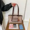 Bolsa de Gran Capacidad para Mujer 2026 Nuevo Estilo Nicho Versátil para Viajar al Trabajo Bolso Tote Súper Caliente Elegante Casual Bolso de Hombro Cruzado