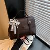 Bolso de mano vintage de gran capacidad estilo academia para mujer, primavera 2025, nuevo estilo coreano, mochila de color sólido, bolso de mensajero texturizado
