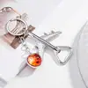 Abrebotellas de avión transfronterizo llavero colgante de llavero accesorio creativo para bolsa de coche en stock al por mayor acrílico