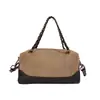 Bolsa Redonda Cilíndrica Retro Melanoid para Mano Mujer Otoño 2026 Nueva Patchwork de Gamuza Bolsa Almohada Cadena Bolso de Hombro Único Cruzado