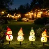Lámpara de muñeco de nieve alimentada por energía solar para decoración de césped en el patio de una villa al aire libre, luz nocturna de jardín impermeable, luz de estaca para suelo de decoración navideña