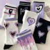 Calcetines para mujer Otoño Nuevo estilo japonés calcetines de media pantorrilla absorbentes de sudor rosa calle moda larga calcetines ins estilo coreano calcetines Zhuji