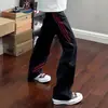 Jeans negros de tres rayas cosidas para hombre, estilo callejero americano retro, pantalones de corte limpio, pantalones rectos adelgazantes, pantalones de microcampana