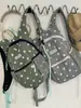 Mochila de lunares transfronteriza, mochila casual y ligera para viajes al aire libre, mochila ligera de gran capacidad para la escuela y el trabajo para estudiantes de secundaria y preparatoria.