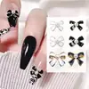 Accesorios para decoración de uñas de lazo, serie pequeña de aleación estilo Chanel, lazo elegante, simple blanco y negro, estilo ins