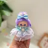 4.0Labubu Cuarta Generación Nuevo Mini Labubu Personaje de Nariz Pequeña Ropa Impermeable Chubasquero y Botas de Lluvia Set