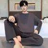 Pijamas populares de algodón puro para hombre, manga larga para primavera y otoño, nuevo conjunto de ropa de casa de otoño para hombre 2026, talla grande, se puede usar fuera