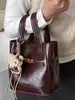 Bolso Cesta de Verduras Retro de Mano para Mujer 2025 Invierno Nuevo de Moda Estilo Coreano Bolso Cubo Bolso de Hombro Único Bolso Cruzado