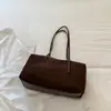Bolsa de ombro de camurça retrô de nicho estilo coreano, novo modelo outono 2026, cor sólida moderna de grande capacidade para o dia a dia