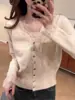 Estilo perezoso 2026 nuevo suéter abrigo de punto cárdigan top versátil con cuello en V y encaje empalmado para mujer elegante